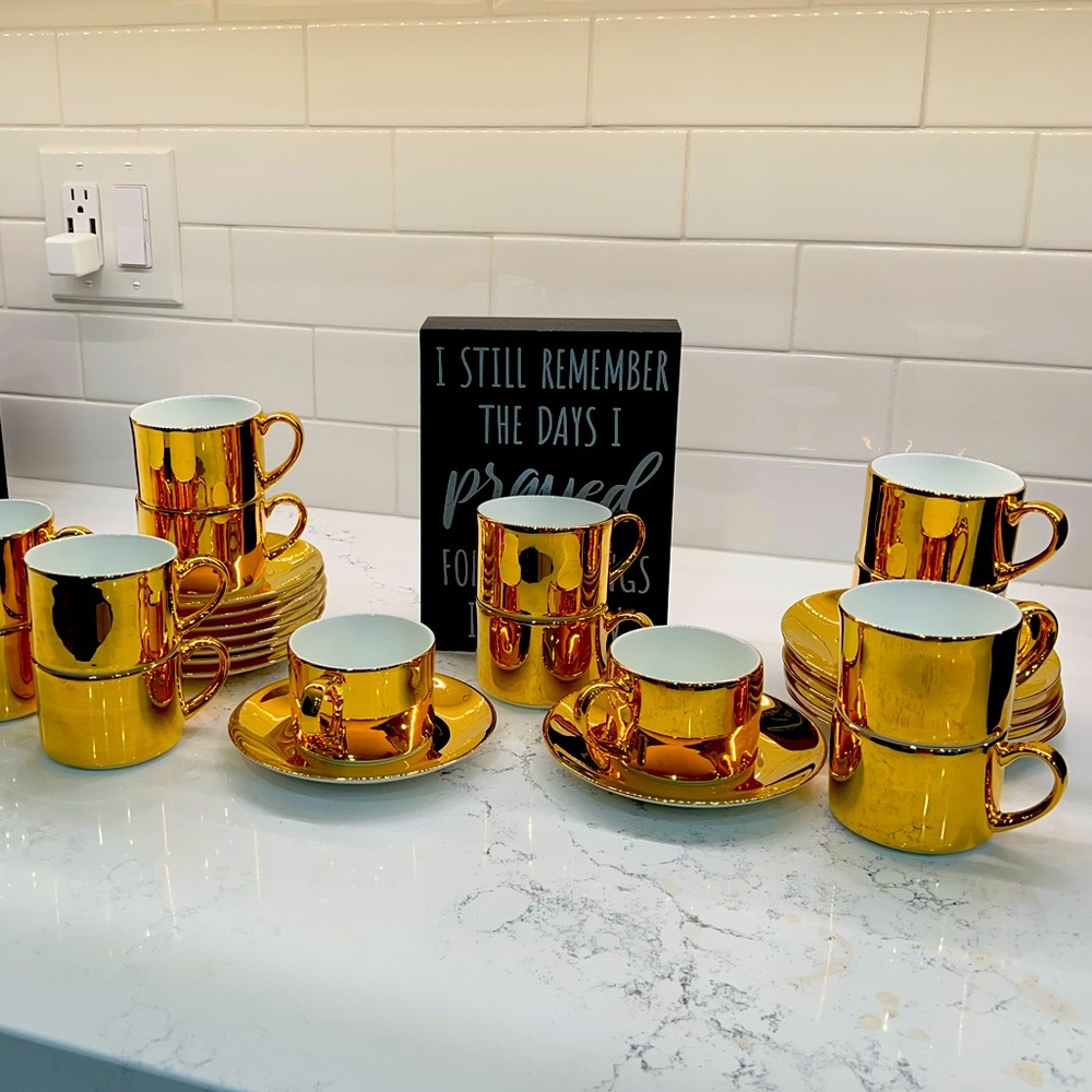 14 karat gold plated coffee and saucer set. Set of 12